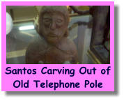 Santos Carving Out ofOld Telephone Pole